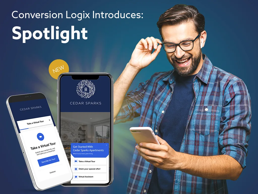 Man wearing glasses looking and smiling at a cell phone he is holding with the cell phone screen display Conversion Logix Spotlight App on a multihousing website